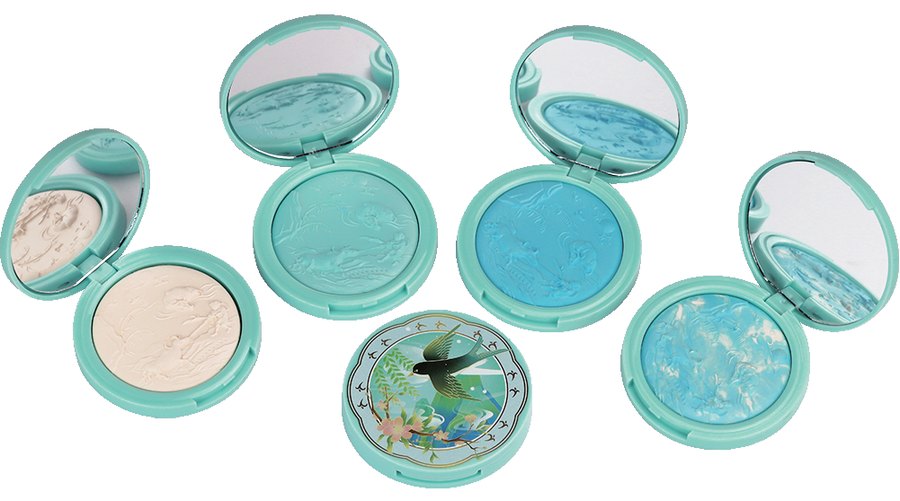 Shell-shaped teal eyeshadow compact with ocean pattern from the Ocean-Themed Series
