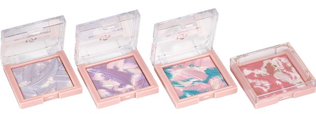 Mini eyeshadow compacts with printed lids
